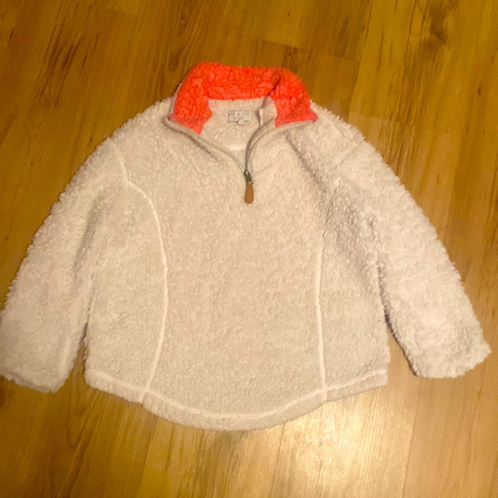 Warm and cozy cream and pink Sherpa.